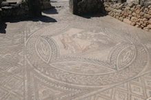 An erotic mosaic damaged in antiquity