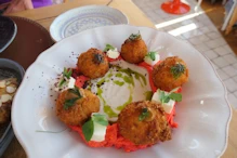 Salmon balls with goats cheese and spiced mash