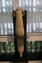 A long and skinny amphora for transporting wine