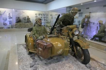 Motercycle with gun on sidercar