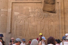 Kobek watching gods of upper and lower Egypt crown a king