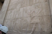 A pharaoh making and offering