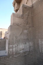 A pharaoh giving water to the Nile