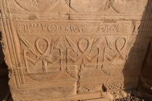 The ankh or key of life with each of its Ka's arms holding a power symbol