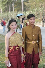 A young couple dressed for photos