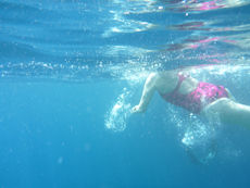 Robyn swimming by