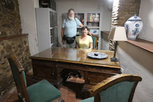 Robyn and Nick behind a very old desk c1650