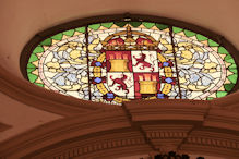 Stained glass window with crest