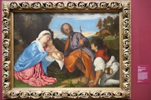 Titian the holy family with shepherd