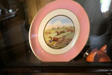 Hunt themed plates with falling riders