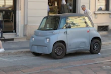 Very small car outside