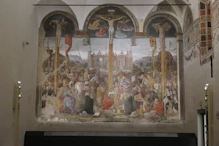 The crusifiction painting at opposite end of refectory