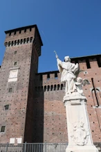 Central inner tower + statue of bishop