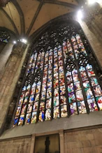 One of the three large stained glass windows at east