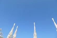 Spires and a very blue sky