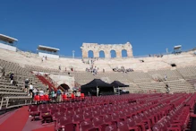 Arena across lower seats looking up to missing top tier