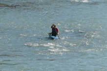 Someone paddling up the river