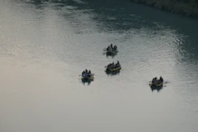 Rubber boats going down river
