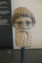 Stone heas with beard