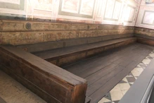 Pews with painted backs