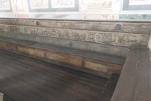 Pews with painted backs