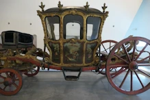 Coach with painted mythical scene