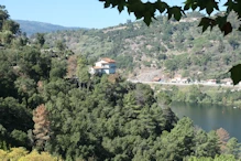 House on bend in river