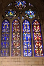 Stained glass windows lower ones vegitable upper human