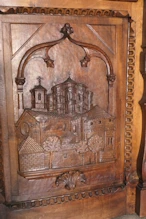 Carved panel on door of municipal building