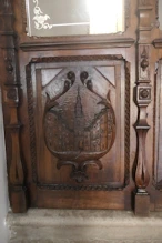 Carved panel on door of municipal building