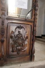 Carved panel on door of municipal building