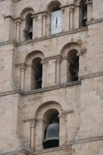 A very large bell in the bell tower
