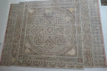 Large mosaic mounted on wall