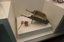 Toy wheelbarrow and bucket