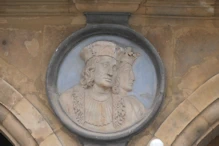 One of many heads above the collonade