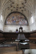 Stand for song books with painting behind