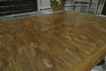 A marquetry table in vestments room