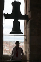 A bell with Robyn below