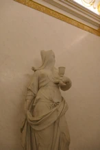 Sculpture of justice wearing a veil