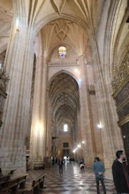 The asile below stained glass window
