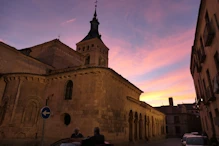 A church with a red sky behind