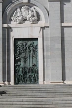 Cast door with heavy relief