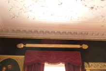 Very ornate rod above curtain
