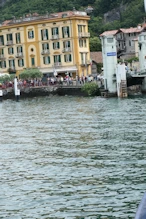 People queue to get on the boat at Varenna