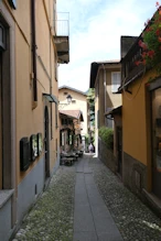 Belargio view in narrow street to lake