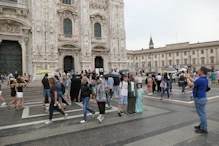 Line to enter cathedral winding all around square