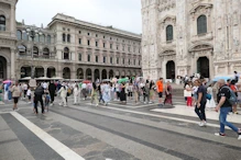 Line to enter cathedral winding all around square