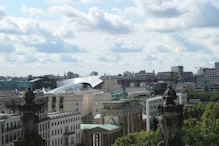 Brandenburg Gate and US Embassy with large shiny crescent