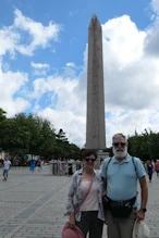 Robyn + Nick in front of obelisk