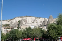 View to hills in town + moon